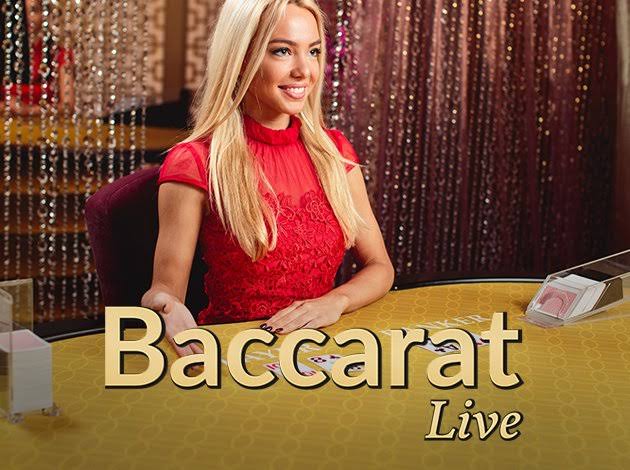 Live baccarat table with dealer and cards at Betbit